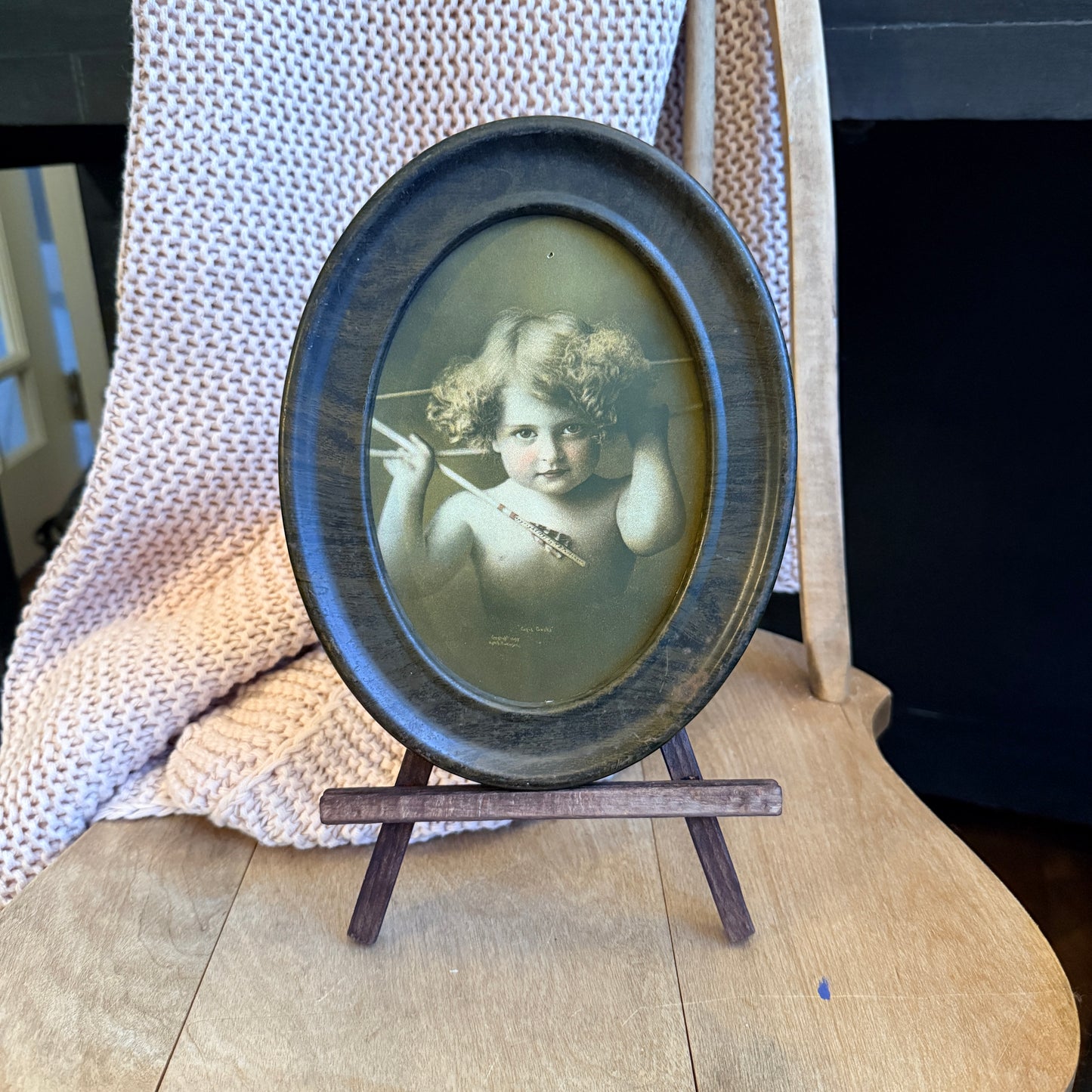 Antique Cupid Awake Print – Oval Metal Frame