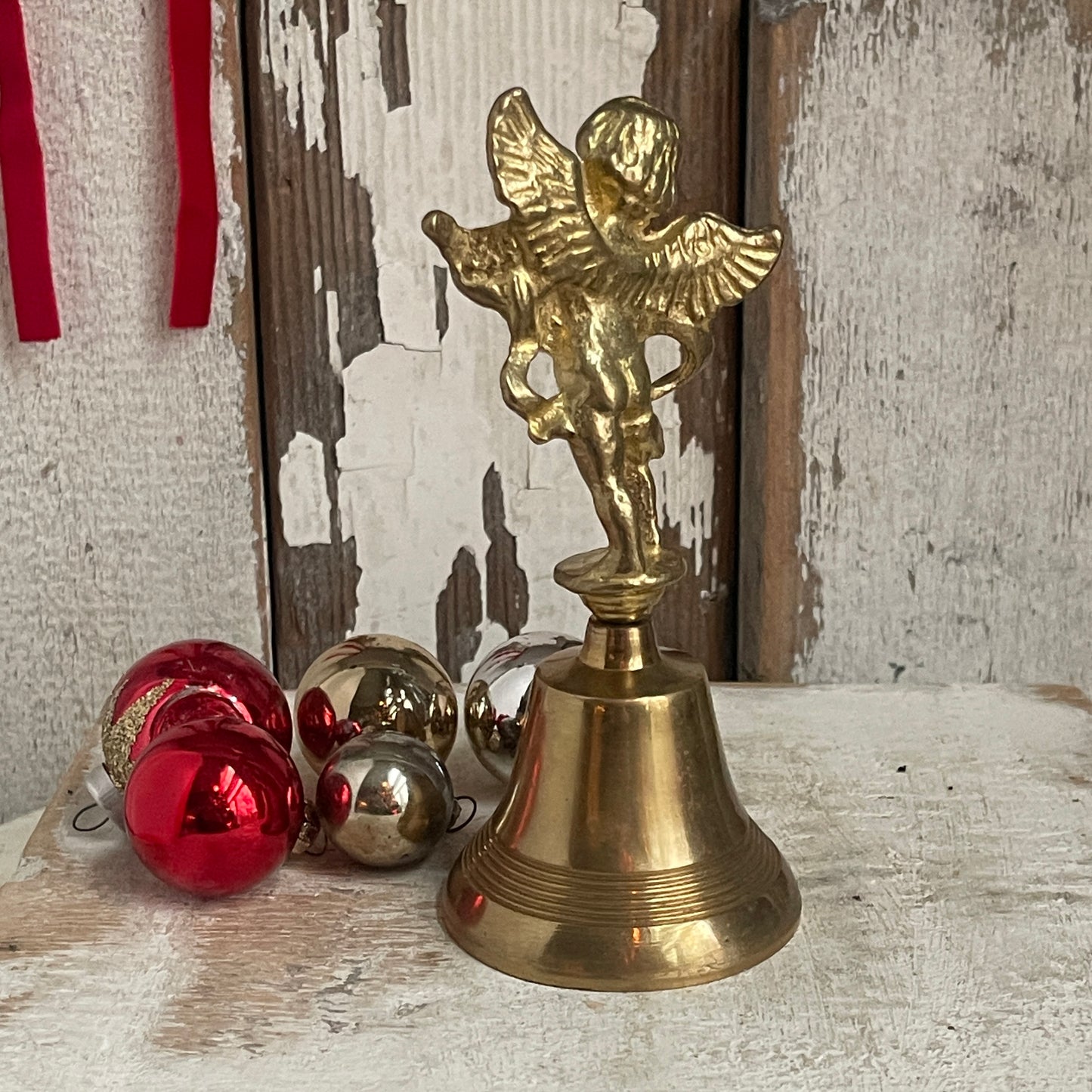 Brass Hand Bell with Cherub