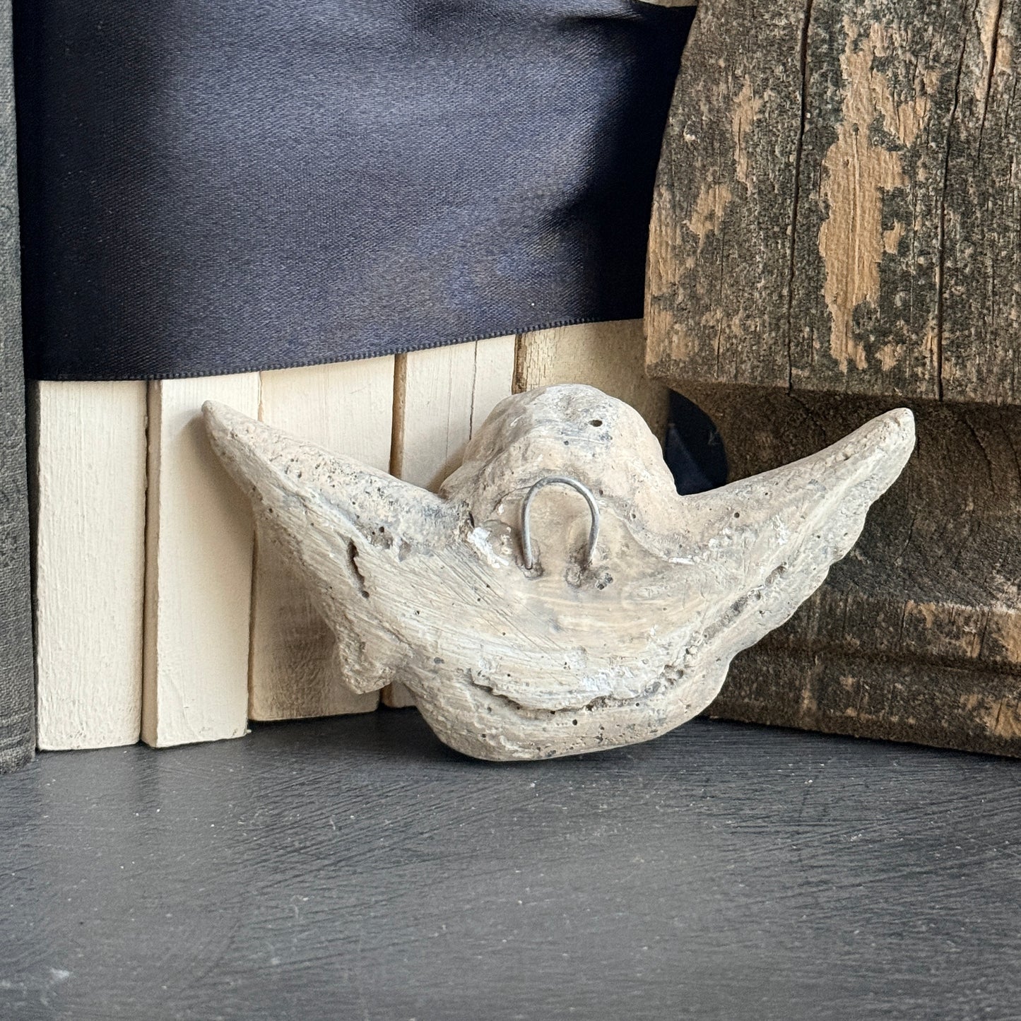 Pouting Cherub Wall Plaque