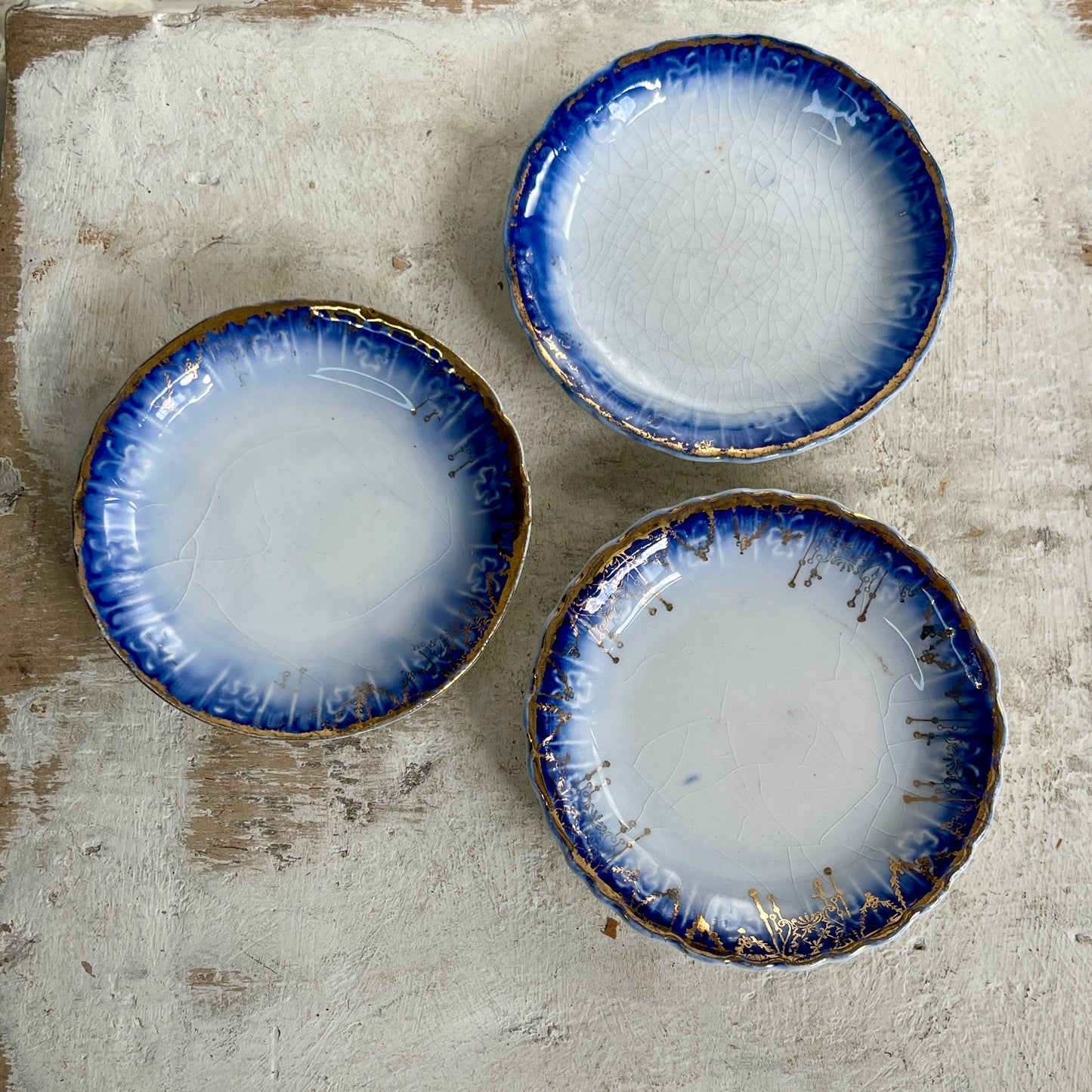 Antique Flow Blue Butter Pats - Set of Three