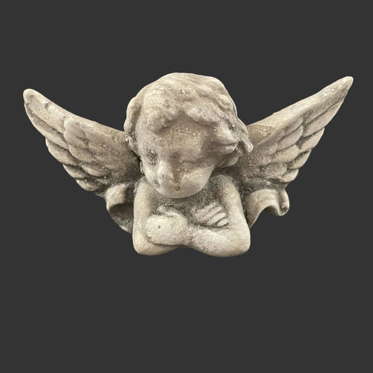 Pouting Cherub Wall Plaque