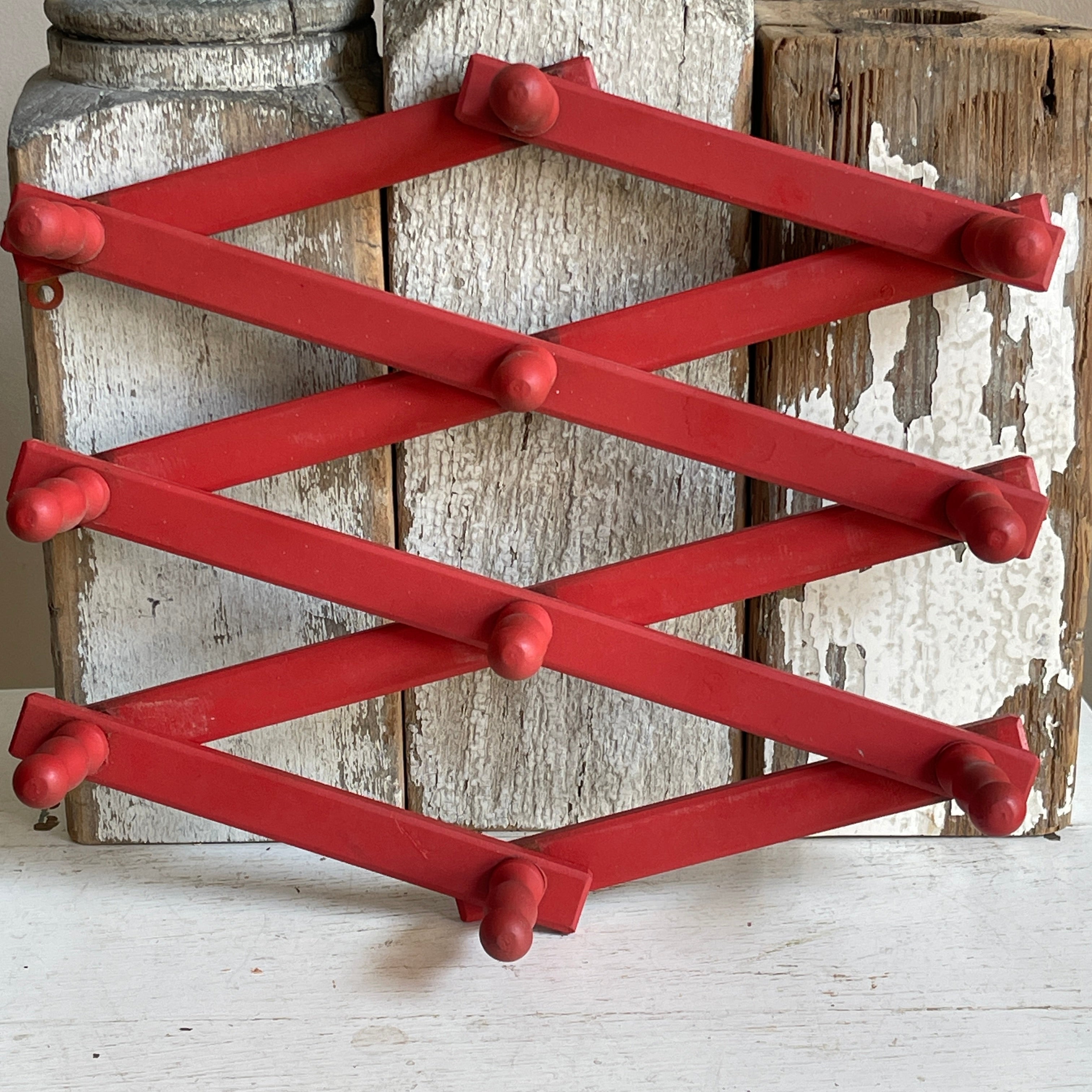 Accordion peg rack hot sale